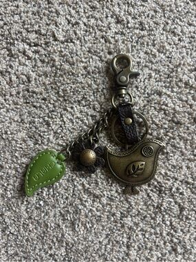 Chala Bronze Bird Keychain with Green Leaf Charm